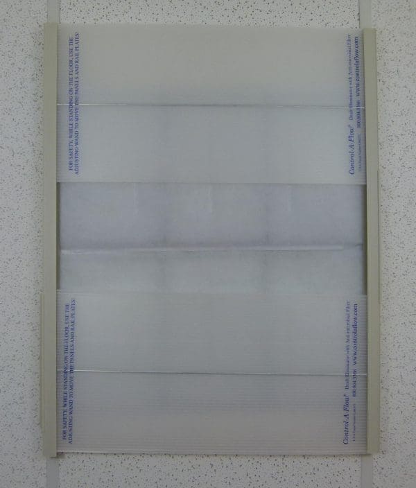 A translucent plastic document holder with multiple pockets.